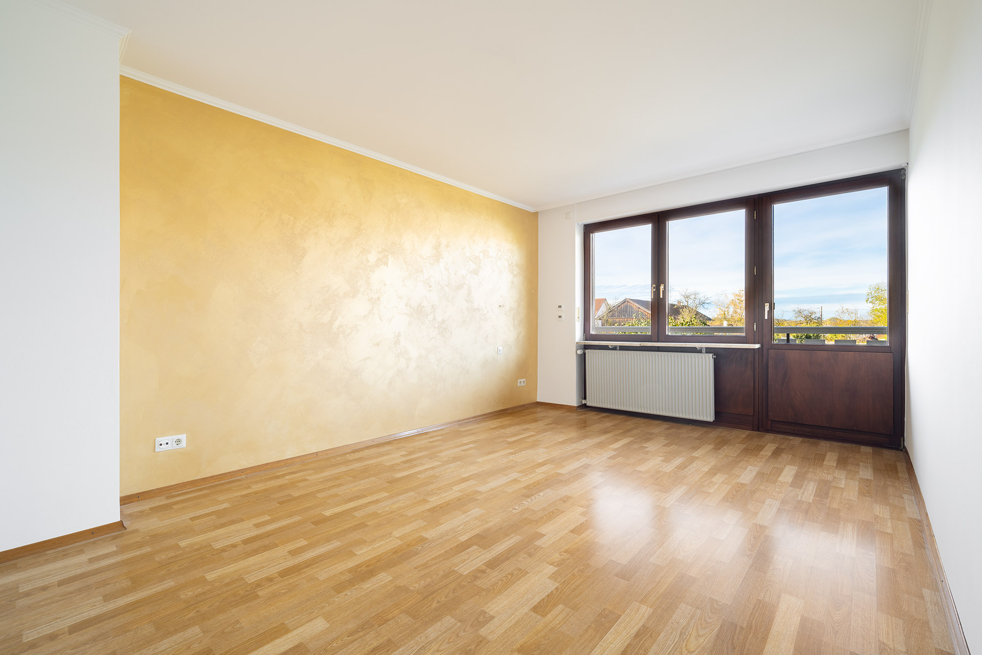 Schlafzimmer mit Balkonzugang